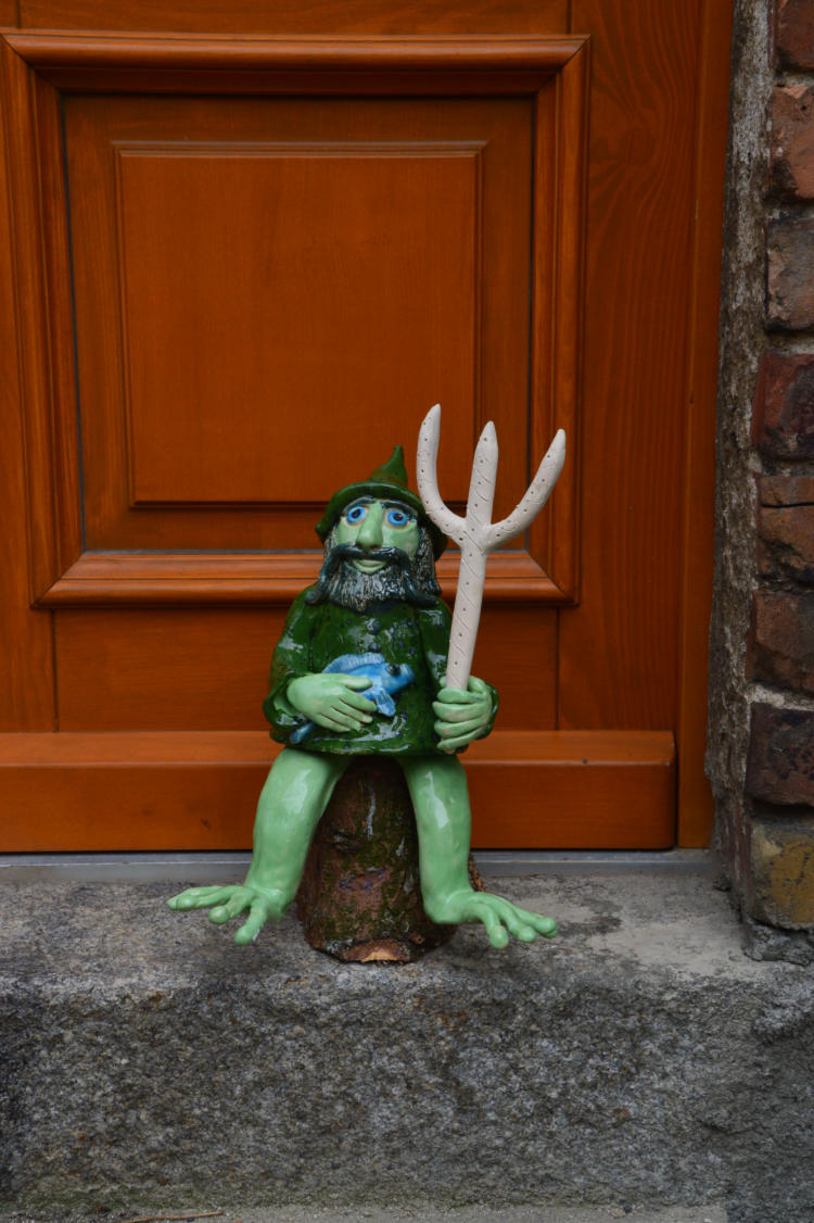Detailfigur am Eingang der Mühle Baruth